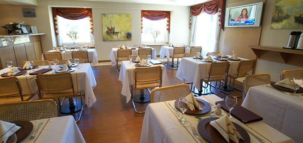 Hotel Aeroparque Inn & Suites Buenos Aires Restoran foto